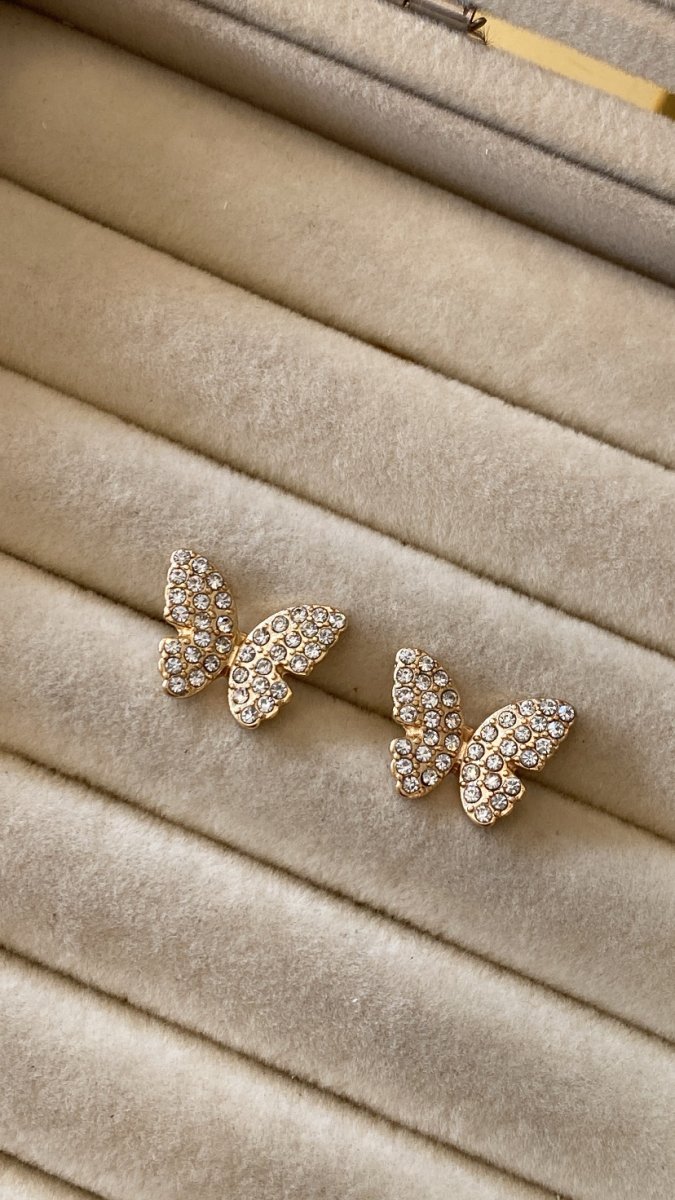 Brinco borboleta com strass